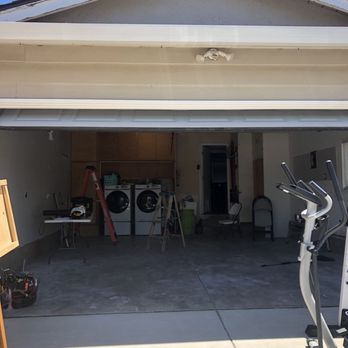 Mighty Works Construction - Garage floor (before) - General Contractors Near Me
