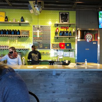 Unity Brewing - two people sitting at a bar - Brewpubs Near Me - Latrobe, Pennsylvania