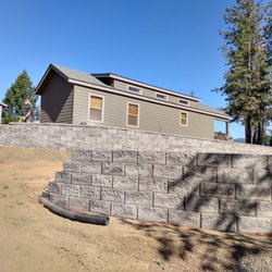 Trinity Landscaping - Two 90ft retaining Walls. Call Dennis for a free estimate today! 509-314-0560