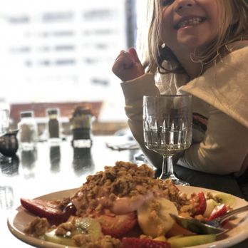 Dozens - Happy kid eating at Dozens. - Breakfast & Brunch Near Me - Denver, Colorado