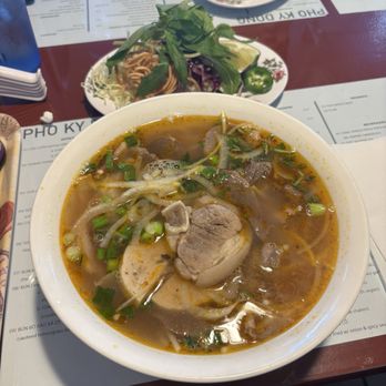 Pho Ky Dong - Hue Style's Beef Noodle Soup with veggie toppings on the side - Vietnamese Near Me - Tustin, California