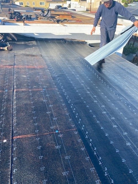 Slide of M R Roofing