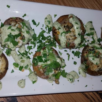 BJ's Restaurant & Brewhouse - Stuffed Mushroom! $5.95...good price! Very good. Not over cooked. The flavor is AMAZING! Okay I have to go back to eating these mushrooms! - New American Near Me - Mentor, Ohio