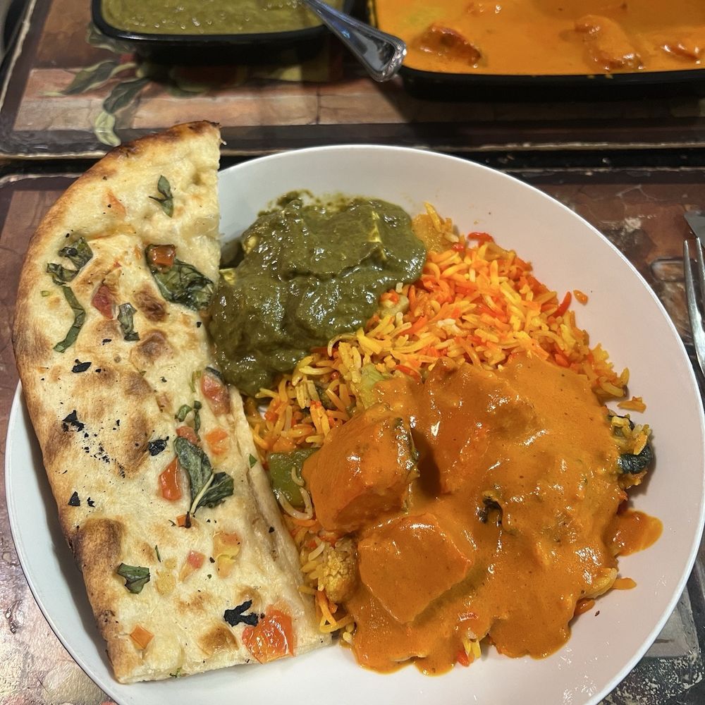 Chicken tikka masala , Palak Paneer , Tomato basil naan , Biryani (vegetable) Chicken tikka masala , Palak Paneer , Tomato basil naan , Biryani (vegetable)