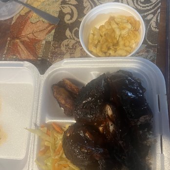 Dalia’s Caribbean Kitchen - Jerk chicken with red beans and rice. Cabbage and fried plantains and a side of Mac and Cheese. - Caribbean Near Me - Youngstown, Ohio
