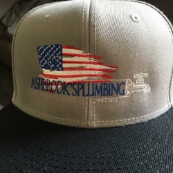 Print-N-Play - Ashbrook's Plumbing embroidered hats.