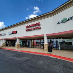 Vaqueros Western Wear - Small strip mall store.
