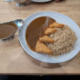 Create Your Own Curry: large, with brown rice, spice level 5, and tofu katsu, for $17.70 from the dine-in menu Create Your Own Curry: large, with brown rice, spice level 5, and tofu katsu, for $17.70 from the dine-in menu