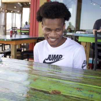 Shaggy's on the Rez - He is all smiles waiting on his alligator bites!!! - American Near Me - Brandon, Mississippi Shaggy's on the Rez - He is all smiles waiting on his alligator bites!!! - American Near Me - Brandon, Mississippi