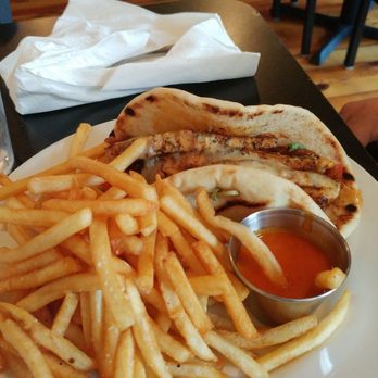 Brookland Eats - Tri-heat chicken pita w/ fries. - American Near Me - Roxboro, North Carolina Brookland Eats - Tri-heat chicken pita w/ fries. - American Near Me - Roxboro, North Carolina
