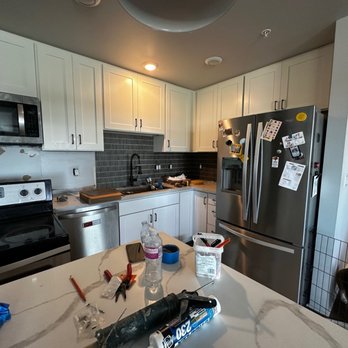 Amcor Construction - Kitchen uppers and backsplash (in progress) - General Contractors Near Me