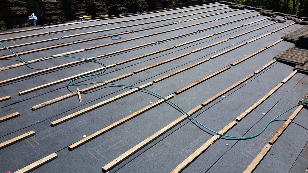 Slide of Black Diamond Roofing