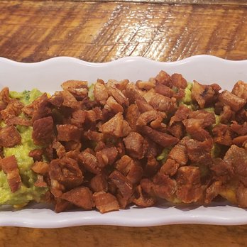 Acento Latin Kitchen and Bar - Fantastic food especially these tostones with pork rinds! - Latin American Near Me - Astoria, New York Acento Latin Kitchen and Bar - Fantastic food especially these tostones with pork rinds! - Latin American Near Me - Astoria, New York