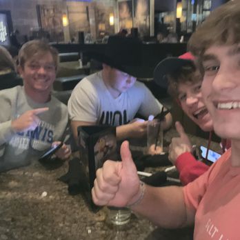 BJ's Restaurant & Brewhouse - Our friend in the cowboy hat is the one celebrating his birthday! - New American Near Me - Waco, Texas