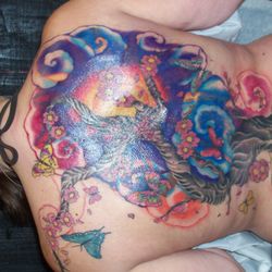 Living Canvas Tattooing & Body Piercing Studio - Ruined my entire back....