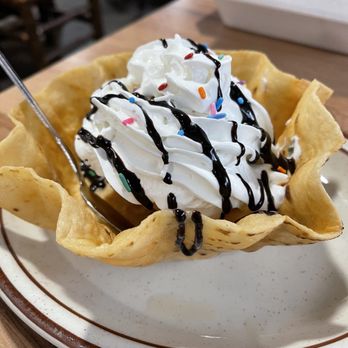 Los Toritos - a dessert with whipped cream and chocolate sauce - Mexican Near Me - Crossville, Tennessee Los Toritos - a dessert with whipped cream and chocolate sauce - Mexican Near Me - Crossville, Tennessee