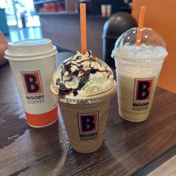 Biggby Coffee - Mocha nut up front, butter bear to the right and a caramel latte on the left ! - Coffee & Tea Near Me - Ocala, Florida Biggby Coffee - Mocha nut up front, butter bear to the right and a caramel latte on the left ! - Coffee & Tea Near Me - Ocala, Florida