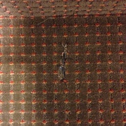 Missing door stopper screw coming out of the floor! Missing door stopper screw coming out of the floor!