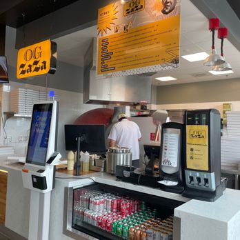 OG ZaZa Pizza & Catering - ROSEVILLE - a man working in a restaurant - Pizza Near Me - Roseville, Minnesota OG ZaZa Pizza & Catering - ROSEVILLE - a man working in a restaurant - Pizza Near Me - Roseville, Minnesota