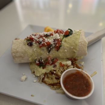 Scramble, a breakfast & lunch joint - Chili verde burrito over hash browns - Breakfast & Brunch Near Me - Phoenix, Arizona