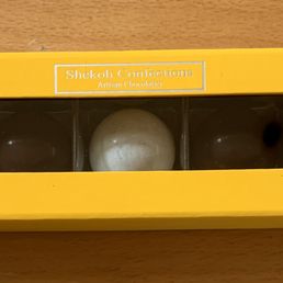 The box of 5 in a beautiful saffron-hued box complete with magnetic closure. The box of 5 in a beautiful saffron-hued box complete with magnetic closure.