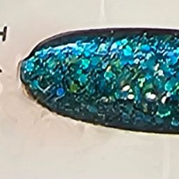 The texture here is slightly bumpy. You can definitely feel the glitter, but it's under a smooth top coat.Mermaid effect. The texture here is slightly bumpy. You can definitely feel the glitter, but it's under a smooth top coat.Mermaid effect.