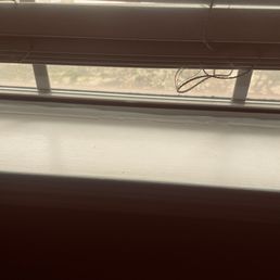 Single pane windows throughout with gaps & constant moisture makes it difficult to maintain inside temps.
