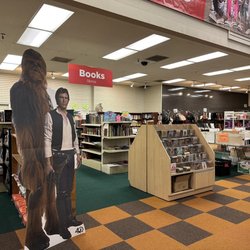 Yard Sale - Lots of books, records, and even life sized movie signs.