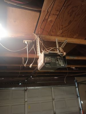 garage door opener install - Father and Son team up on this one... Family owned and Family motivated!!