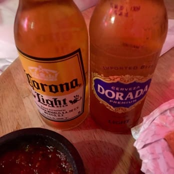 El Rinconcito - two bottles of beer and a hot dog - Mexican Near Me - New Orleans, Louisiana El Rinconcito - two bottles of beer and a hot dog - Mexican Near Me - New Orleans, Louisiana