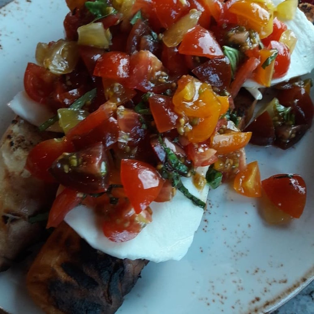 Red Rabbit St. Paul - Bruschetta with Tomatoes, Cheese, and Basil - Italian Near Me - St Paul, Minnesota Red Rabbit St. Paul - Bruschetta with Tomatoes, Cheese, and Basil - Italian Near Me - St Paul, Minnesota