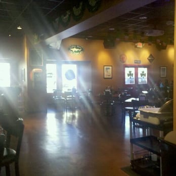 Emil's - view from the seating at the bar toward the dining area and large projector tv screen - American Near Me - Grayslake, Illinois Emil's - view from the seating at the bar toward the dining area and large projector tv screen - American Near Me - Grayslake, Illinois