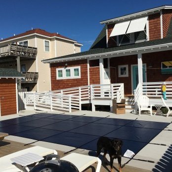 Aquarius Pools & Spas - Newly installed pet and people safety pool cover. - Pool Cleaners Near Me