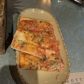 Grotto Downtown - Complimentary bread - Italian Near Me - Houston, Texas Grotto Downtown - Complimentary bread - Italian Near Me - Houston, Texas
