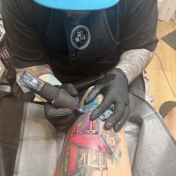 Bright Lantern Tattoo Studio - Steve tattooing pink palace - Tattoo Near Me - Fontana, California