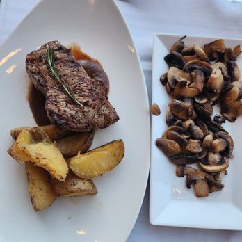 Carlucci's Waterfront - NY Strip with potatoes and a side of mushrooms - Seafood Near Me - Mount Laurel, New Jersey Carlucci's Waterfront - NY Strip with potatoes and a side of mushrooms - Seafood Near Me - Mount Laurel, New Jersey