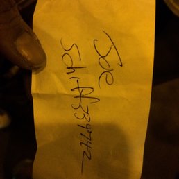 The name of the bus driver in his own handwriting, b/ probably false information bc he verbally told us his name is Charles when we asked.