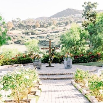 W&L Designs - Flowers for the barrels and she draped fresh flowers and eucalyptus over my cross arch! - Florists Near Me W&L Designs - Flowers for the barrels and she draped fresh flowers and eucalyptus over my cross arch! - Florists Near Me