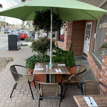 El Jarro - a table with chairs and an umbrella - Mexican Near Me - Lafayette, California El Jarro - a table with chairs and an umbrella - Mexican Near Me - Lafayette, California