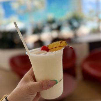 Universal Terra Luna Resort - Pina colada at the pool bar - Hotels Near Me - Orlando, Florida Universal Terra Luna Resort - Pina colada at the pool bar - Hotels Near Me - Orlando, Florida