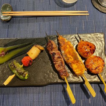 Aina Kauai Restaurant - Grilled vegetables, tsukune, gyu, tsumire, and mango habanero sauce - New American Near Me - Kapaʻa, Hawaii Aina Kauai Restaurant - Grilled vegetables, tsukune, gyu, tsumire, and mango habanero sauce - New American Near Me - Kapaʻa, Hawaii