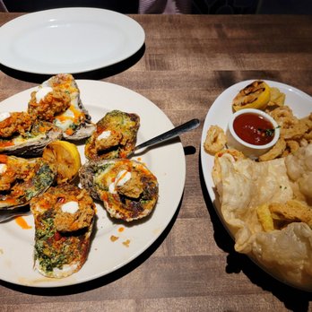 Twelve Kitchen + Cocktails - Oysters Rockefeller and calamari. - New American Near Me - Tyler, Texas Twelve Kitchen + Cocktails - Oysters Rockefeller and calamari. - New American Near Me - Tyler, Texas