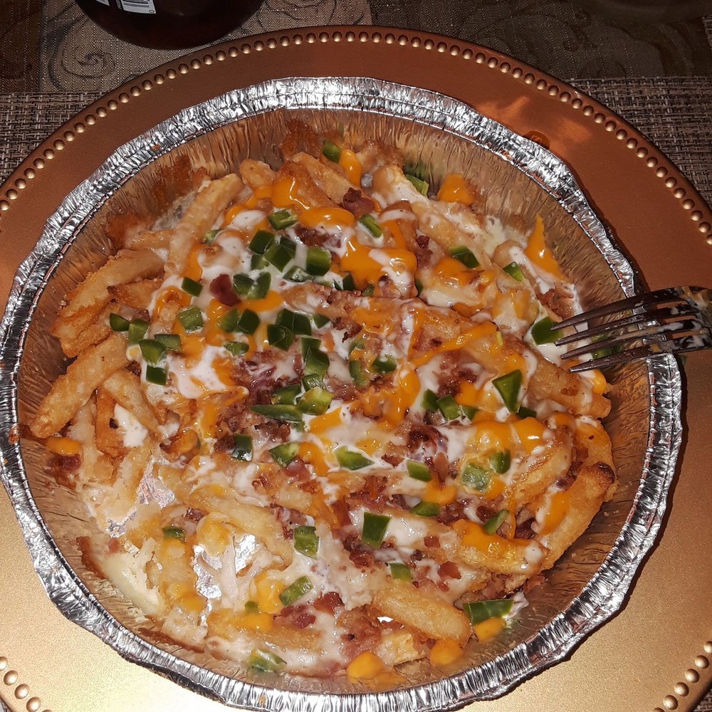 Pizza Roma - a pizza with cheese and green peppers - Italian Near Me - Quakertown, Pennsylvania Pizza Roma - a pizza with cheese and green peppers - Italian Near Me - Quakertown, Pennsylvania