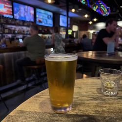 Ice cold beer, and bar with TVs