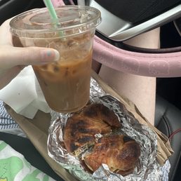Iced latte with homemade lavender syrup, sausage egg and local goat cheese croissant Iced latte with homemade lavender syrup, sausage egg and local goat cheese croissant