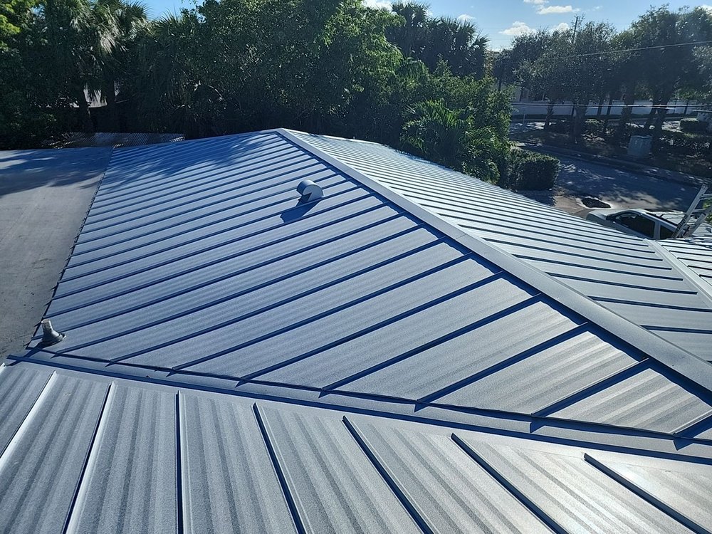 Slide of Dream Team Roofing