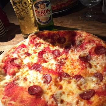 Pizza Express - Classic 'American' pizza with a cold Peroni. - Pizza Near Me - London, XGL Pizza Express - Classic 'American' pizza with a cold Peroni. - Pizza Near Me - London, XGL
