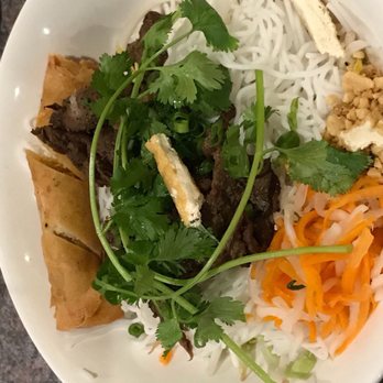 Pho Saigon - Vermicelli with charbroiled lemon grass sliced beef and fried egg roll. Skimpy with the beef. - Vietnamese Near Me - Houston, Texas