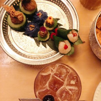 Kiin - Royal Platter and Opera Glasses drink. My favourite was the Chor Ladda, the blue flower shaped dumplings. - Thai Near Me - Toronto, Ontario Kiin - Royal Platter and Opera Glasses drink. My favourite was the Chor Ladda, the blue flower shaped dumplings. - Thai Near Me - Toronto, Ontario