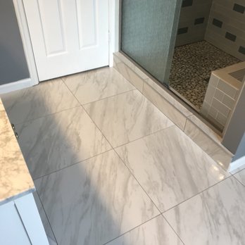 Bryans Enterprises - a bathroom with a marble floor - General Contractors Near Me - Fairfax, Virginia